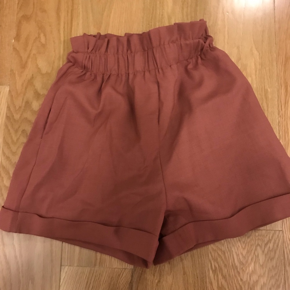 pinky orange shorts